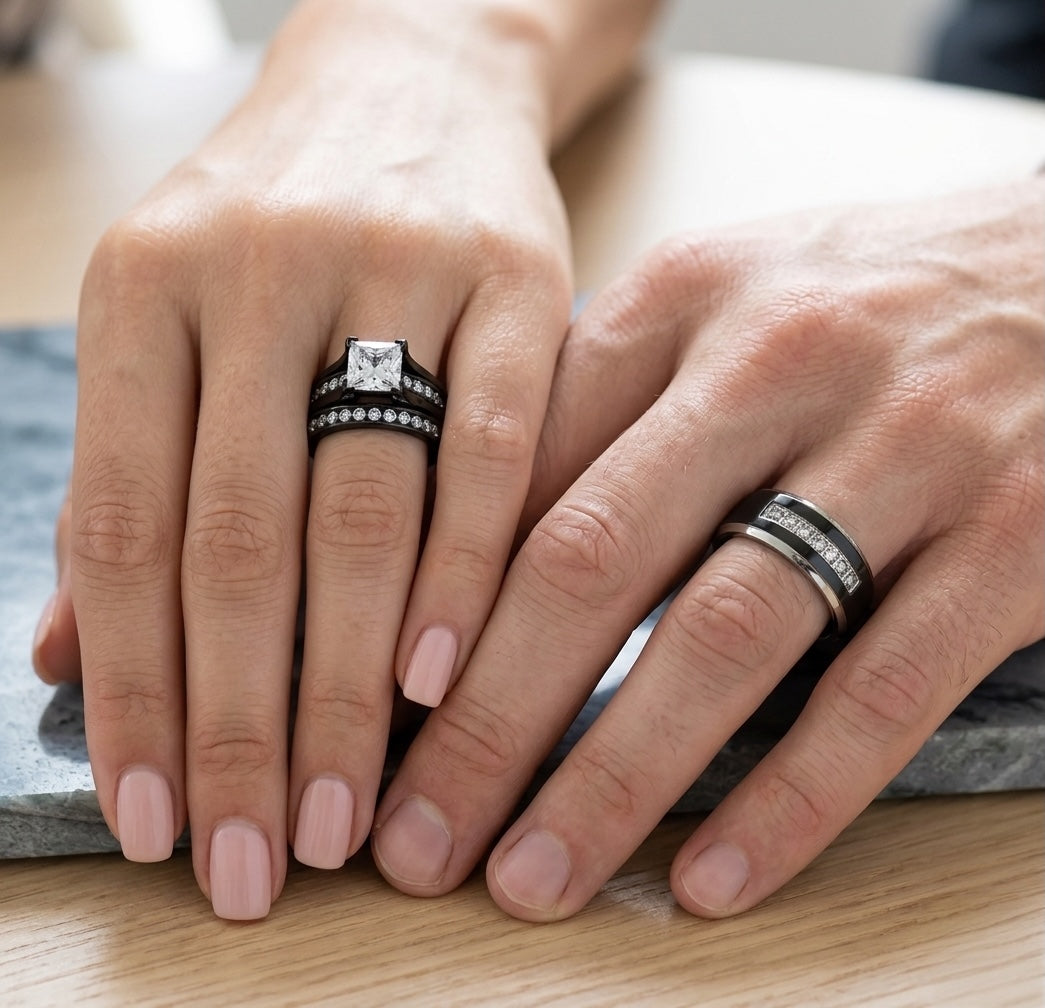 Close-up of hands wearing diamond rings on a wooden surface